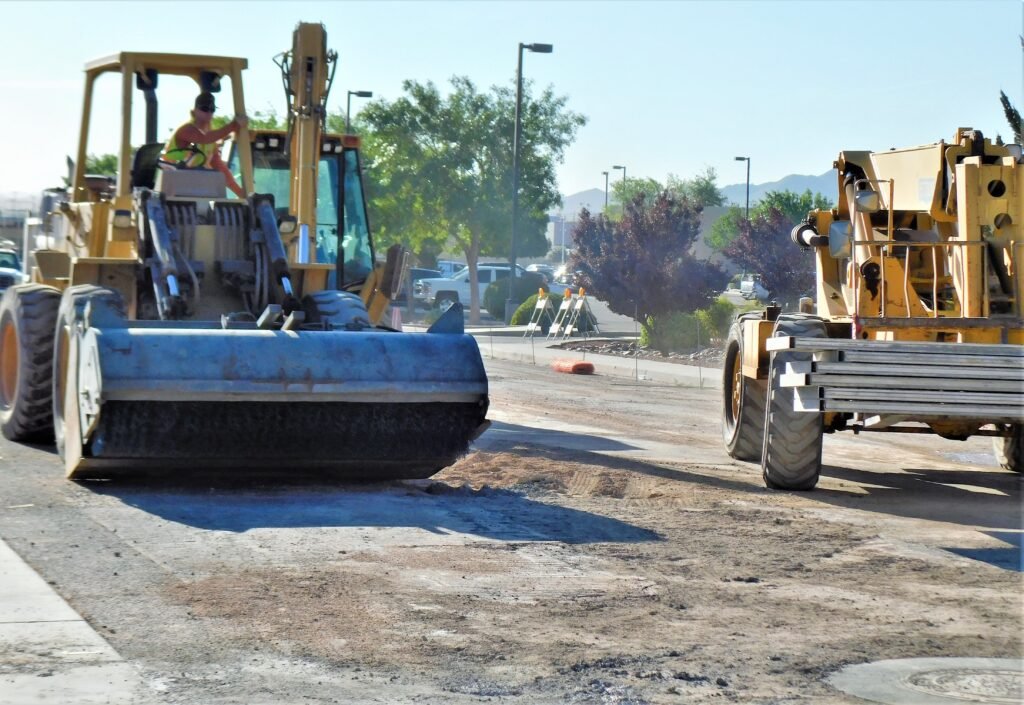 Road resurfacing equipment operating on a street during the Bartow CRA street improvement program